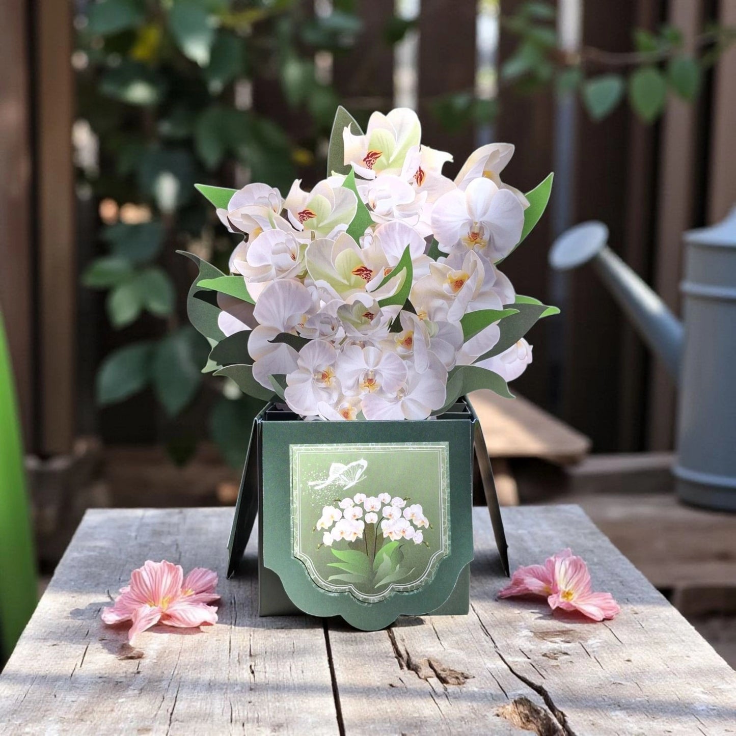 Carte en 3 dimensions représentant un bouquet d'orchidées blanches